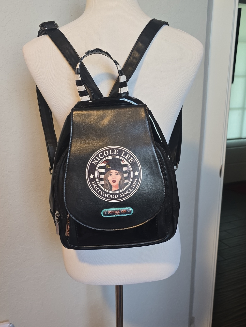 Nicole Lee Black Faux Leather Mini Backpack with Graphic Patch